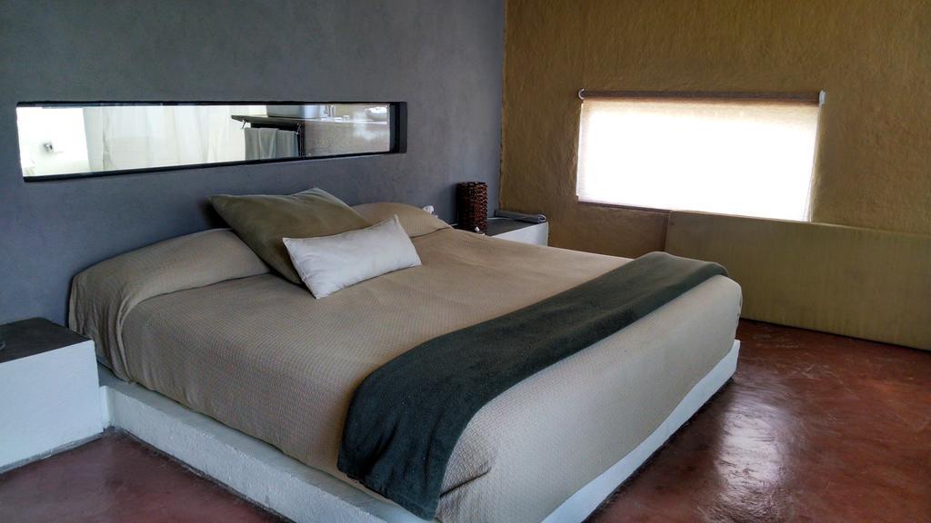 Hotel Boutique La Milagrosa تيبوزتلان الغرفة الصورة